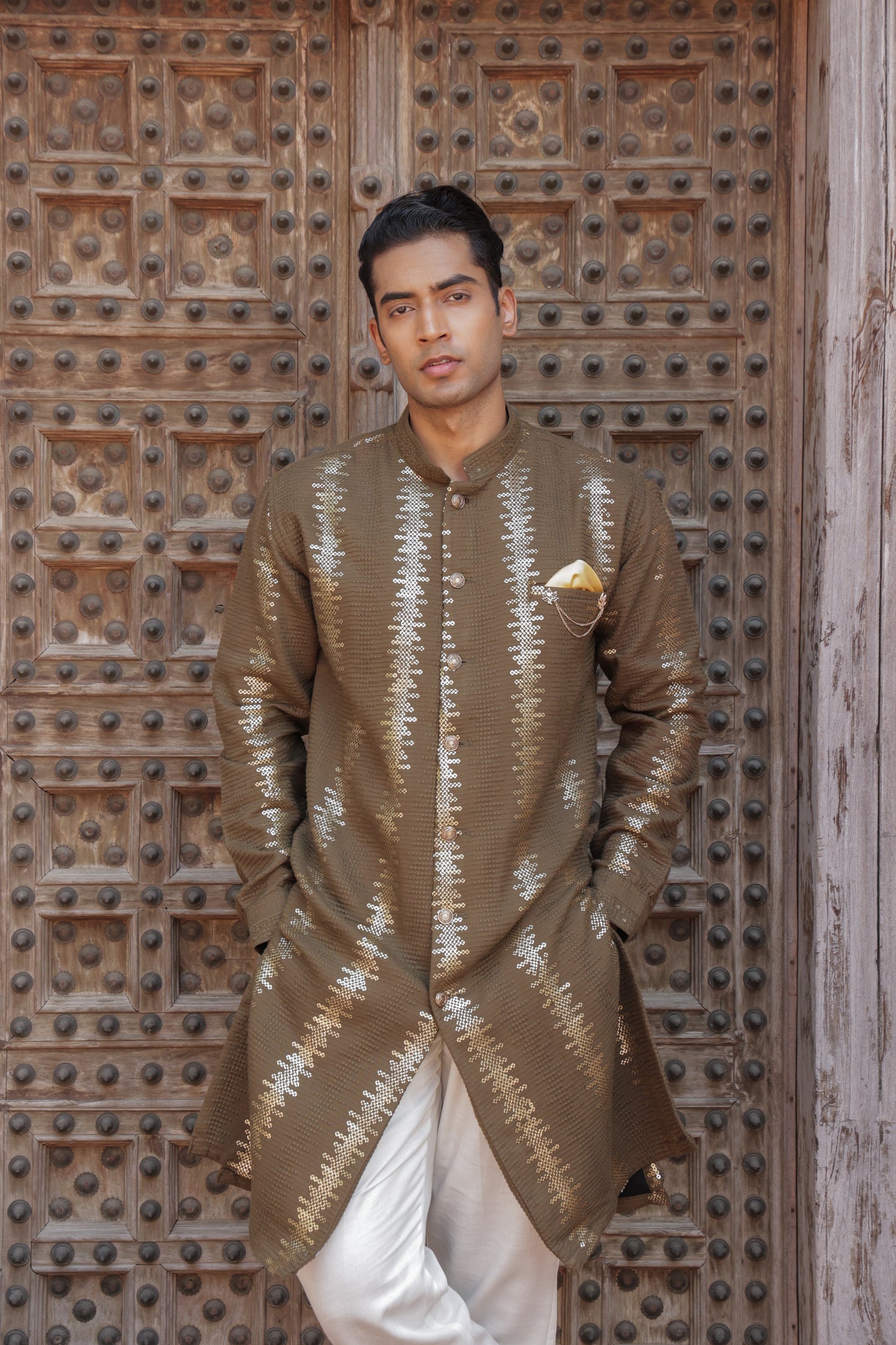 Men's henna or green kurta with golden embroidered in front paired with white churidar, mandarin collar, side pockets, full sleeves - premium Indian formal wear for weddings and special occasion