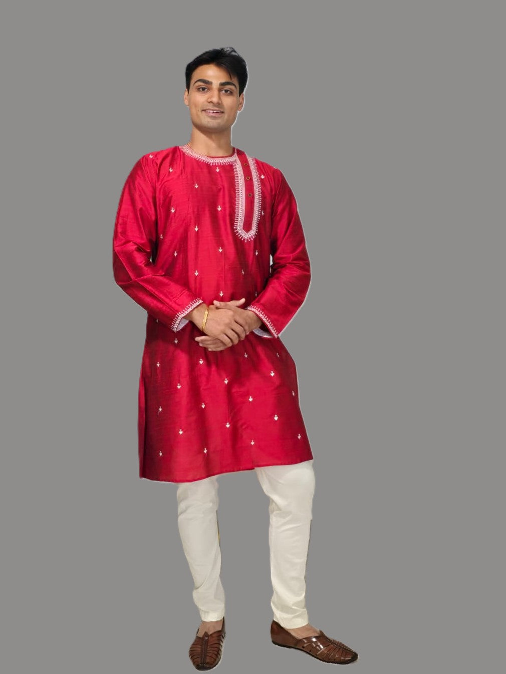 Men's red kurta with white thread embroidered around neck and cuffs, side pockets, full sleeves with side closure - traditional Indian wear for social occasions and festivals
