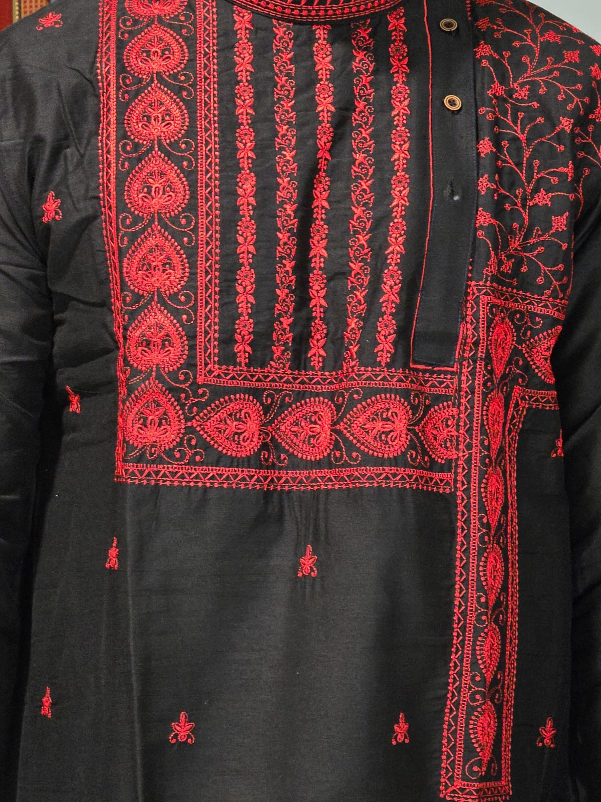 Men's black kurta with red thread embroidered mandarin collar and cuffs, side pockets, full sleeves with side closure - traditional Indian wear for social occasions and festivals