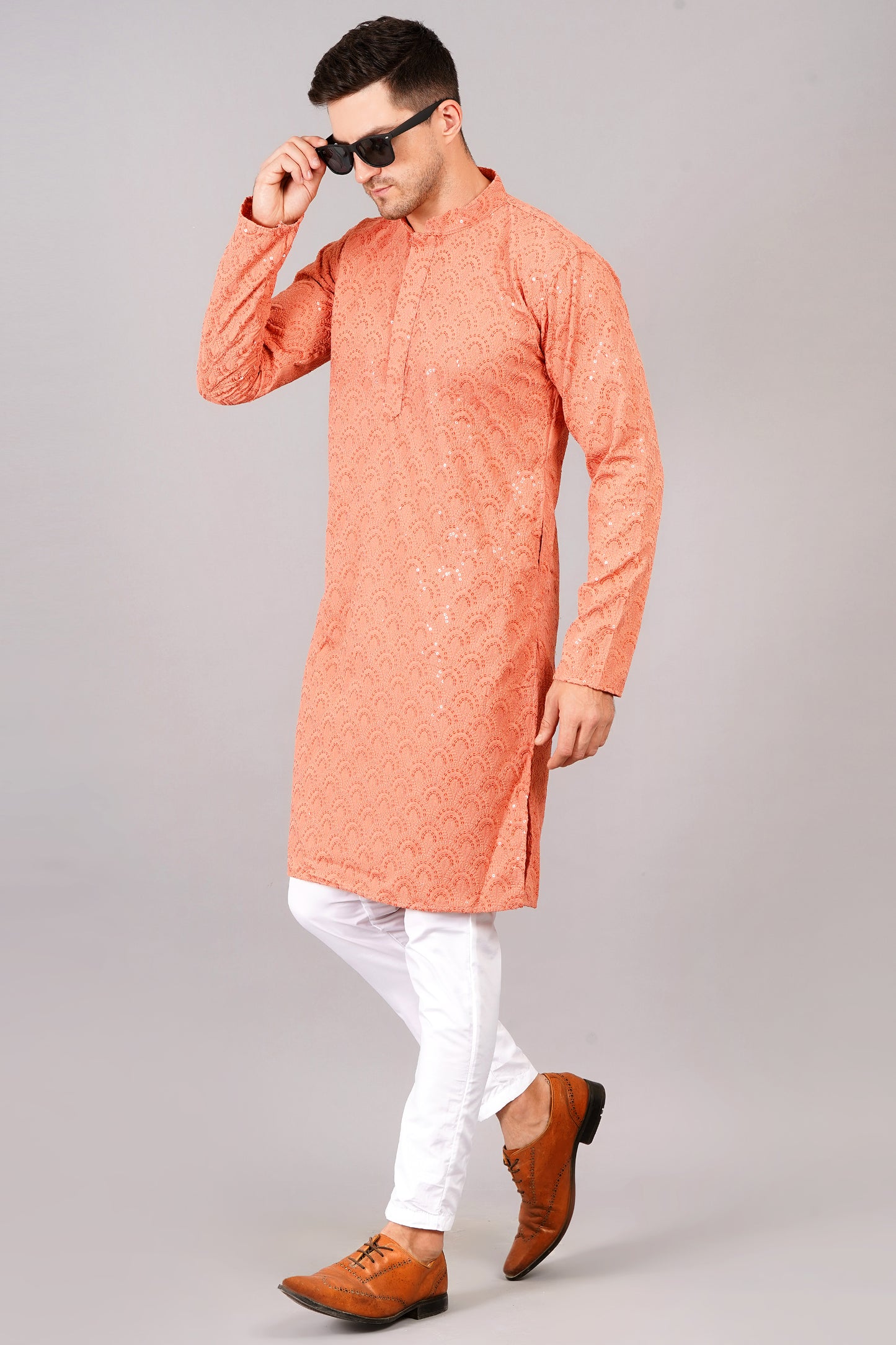 Men coral-orange color or carrot color Kurta with sequin, full length, button closure, one fourth placket, full sleeves, mandarin collar, side pockets, traditional ethnic wear for festivals, family occasions, wedding, house warming, casual wear