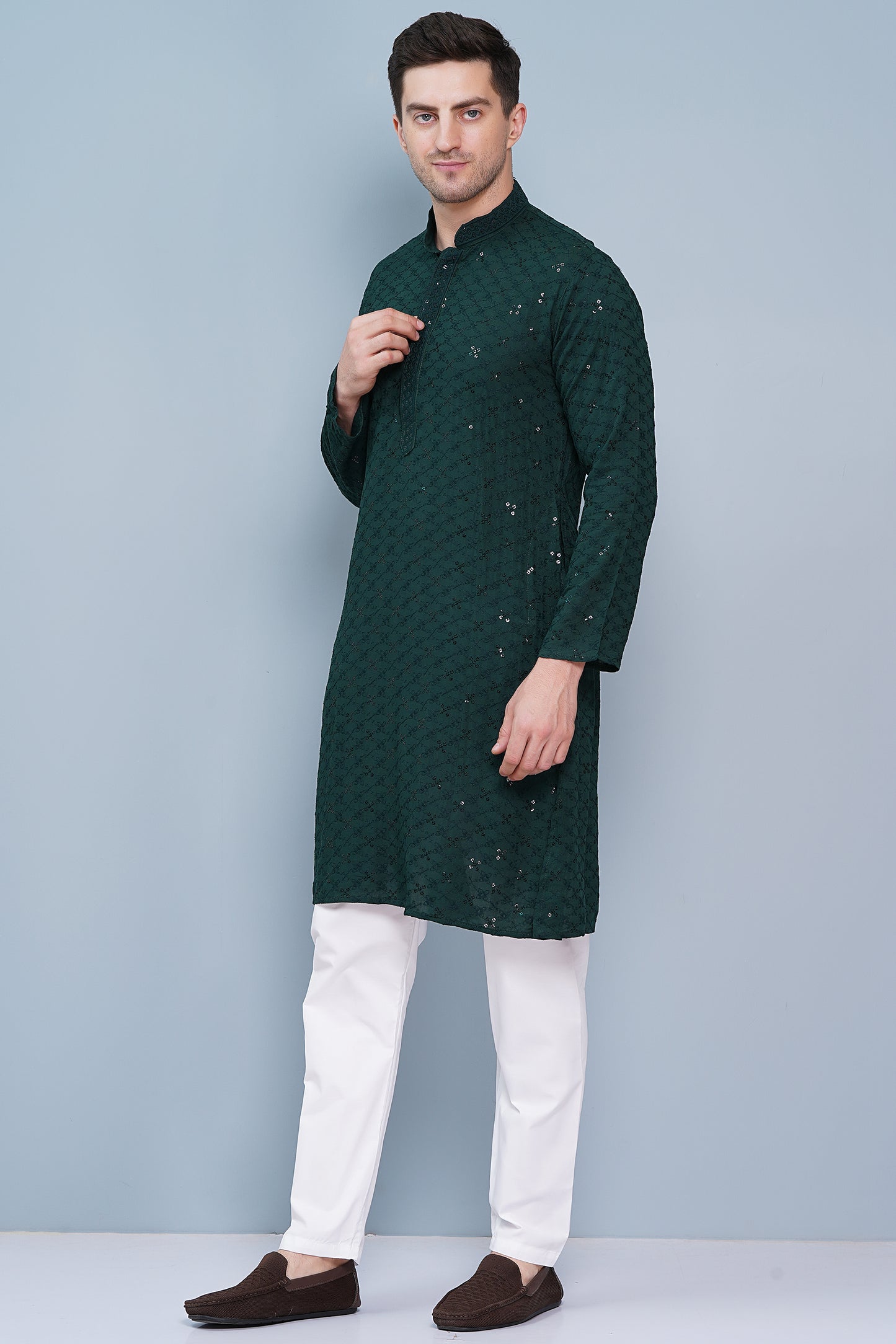 Men dark green or bottle green color Kurta with sequin, full length, button closure, one fourth placket, full sleeves, mandarin collar, side pockets, traditional ethnic wear for festivals, family occasions, wedding, house warming, casual wear