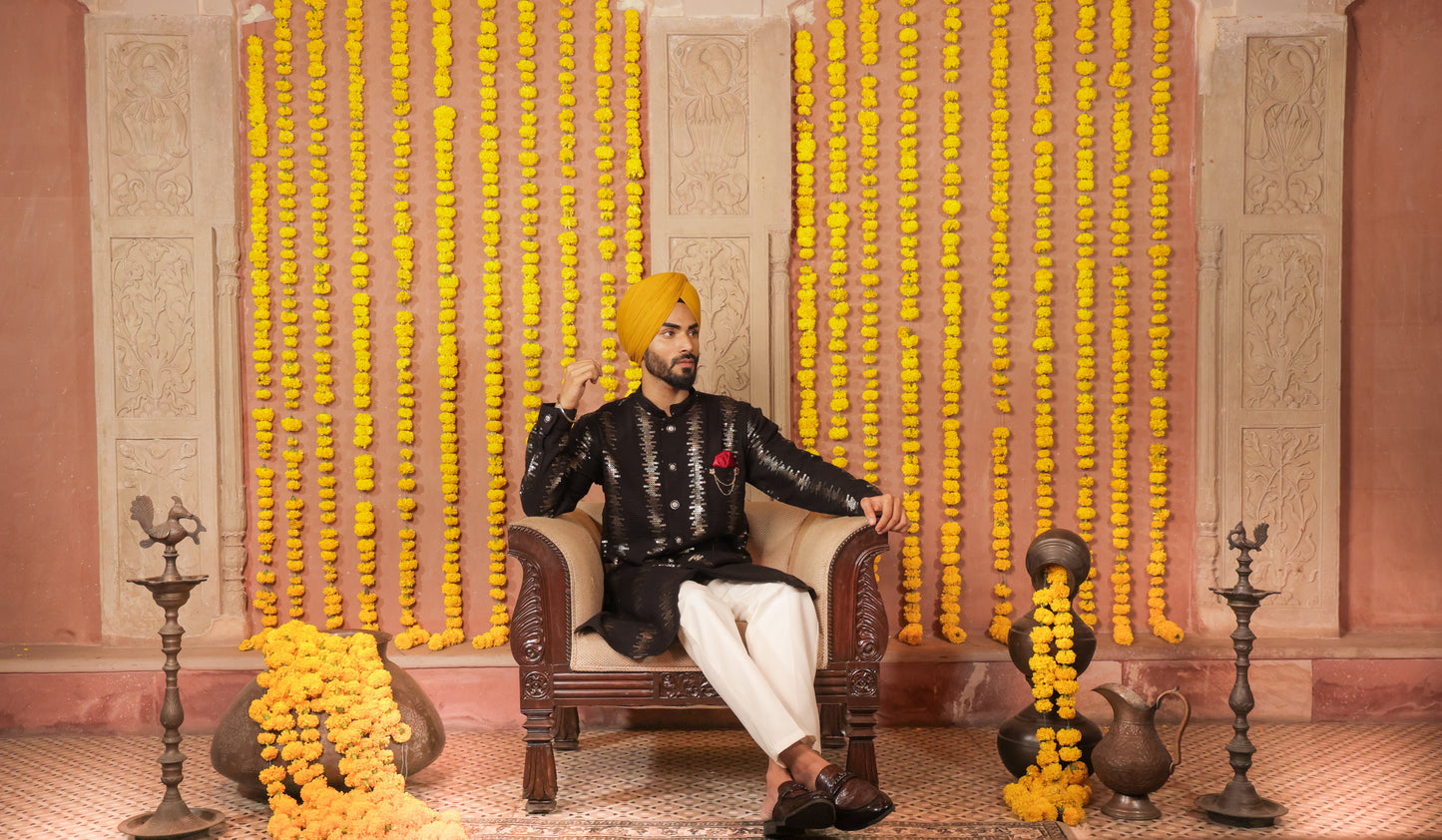 Men's black kurta silver embroidered in front paired with white churidar, mandarin collar, side pockets, full sleeves - premium Indian formal wear for weddings and special occasions