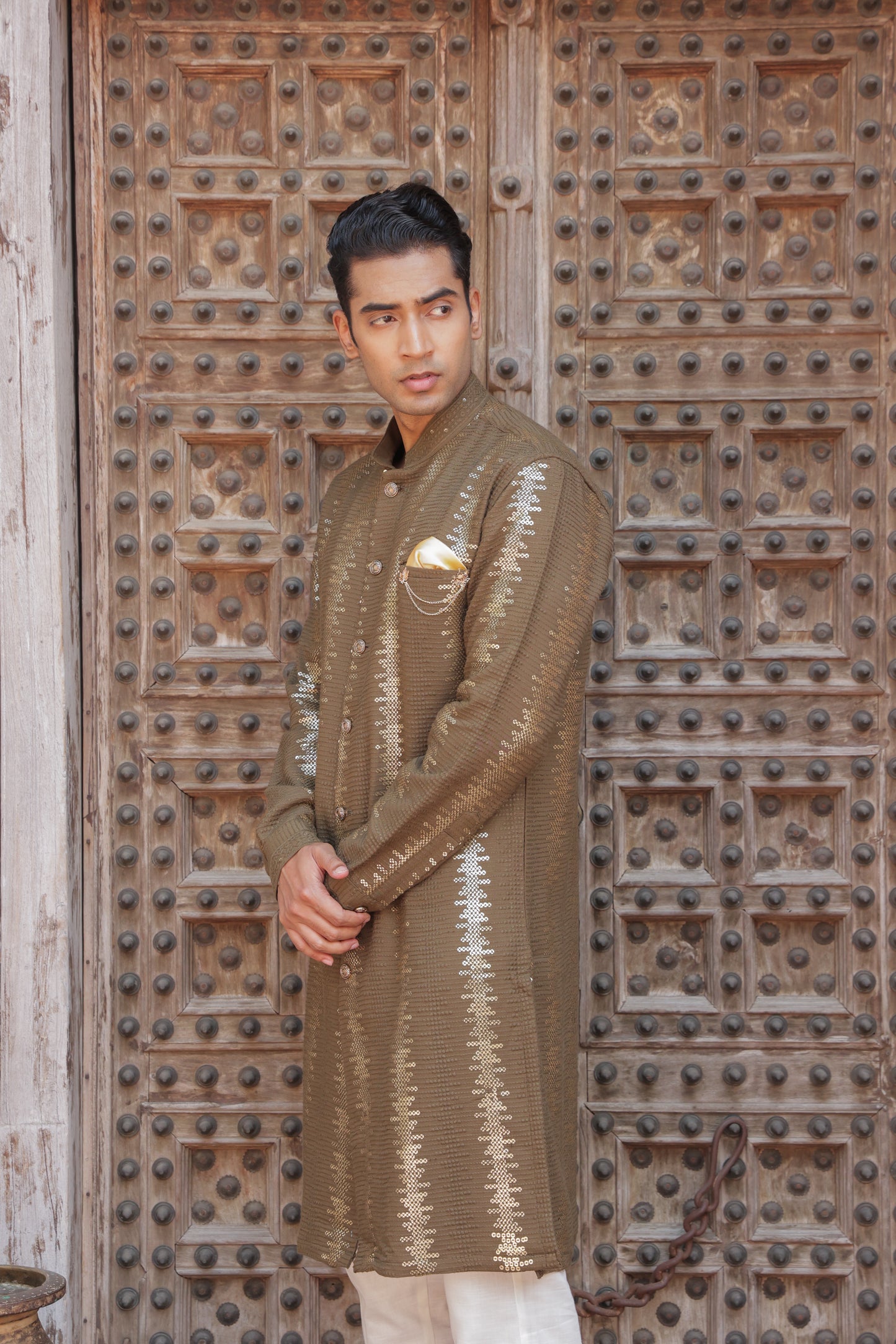 Men's henna or green kurta with golden embroidered in front paired with white churidar, mandarin collar, side pockets, full sleeves - premium Indian formal wear for weddings and special occasion