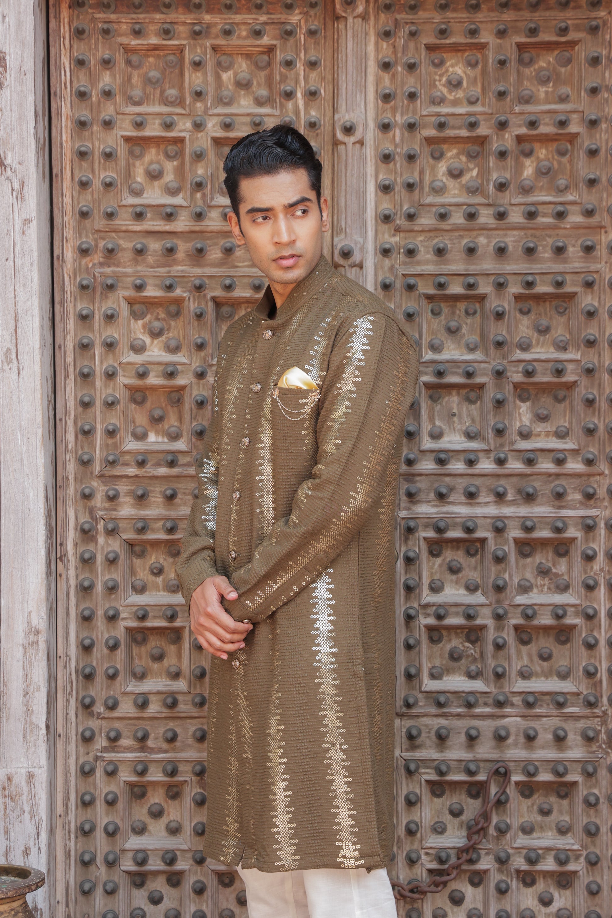 Men's henna or green kurta with golden embroidered in front paired with white churidar, mandarin collar, side pockets, full sleeves - premium Indian formal wear for weddings and special occasion