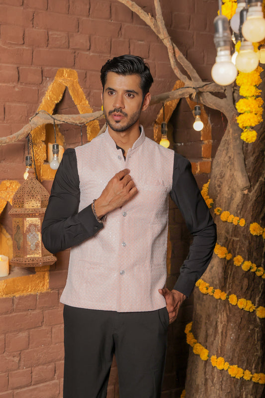 Nehru or Modi peach color jackets featuring self embroidery. Perfect for wearing on social occasions or wedding