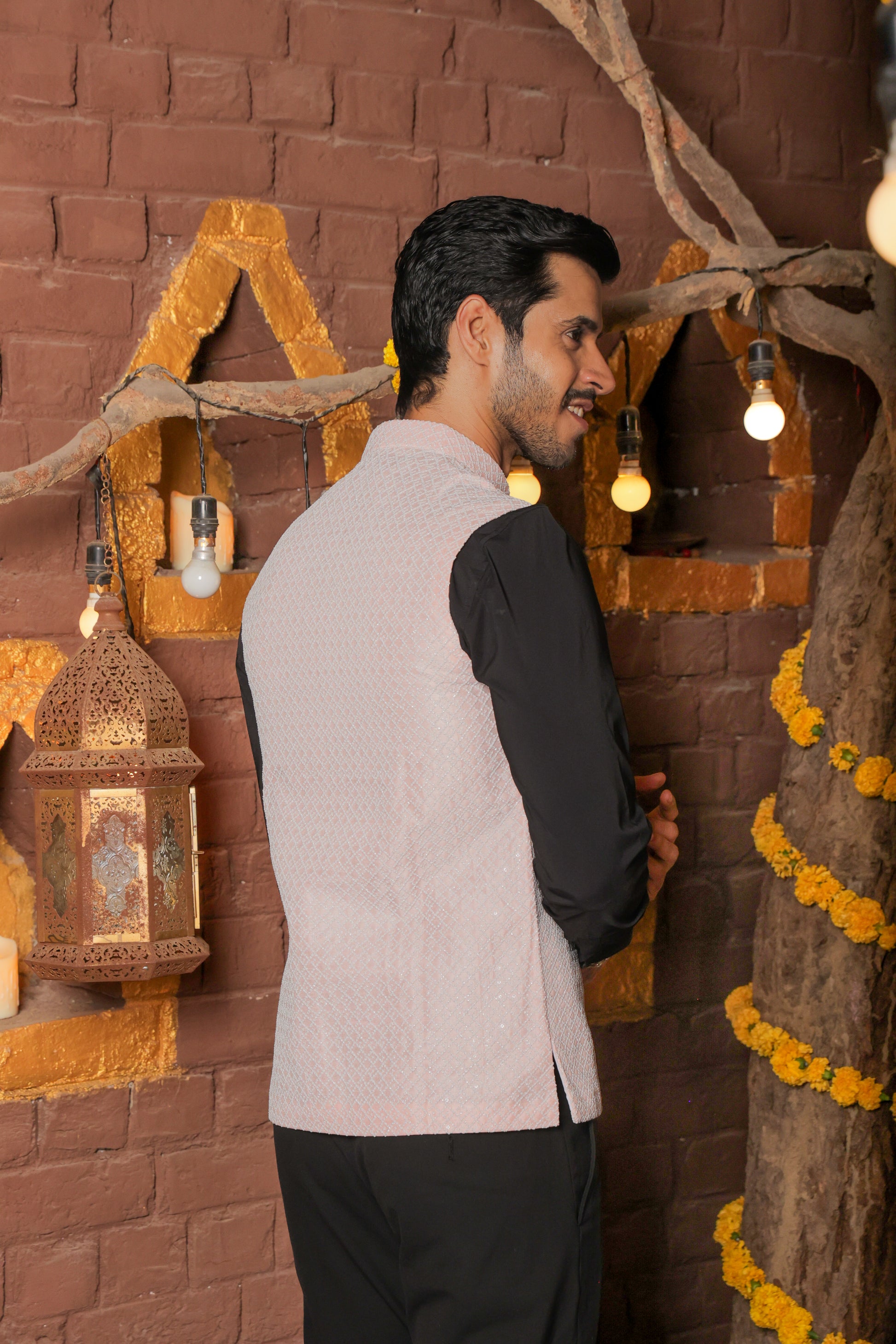 Nehru or Modi peach color jackets featuring self embroidery. Perfect for wearing on social occasions or wedding