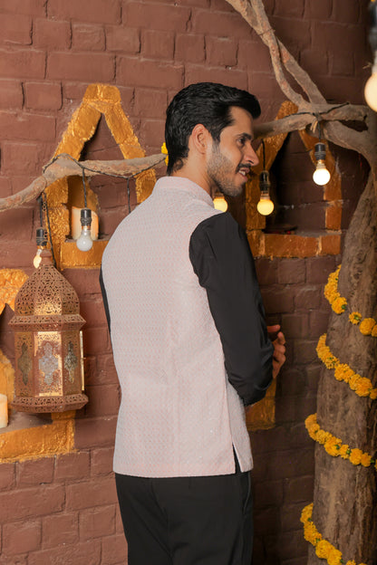 Nehru or Modi peach color jackets featuring self embroidery. Perfect for wearing on social occasions or wedding