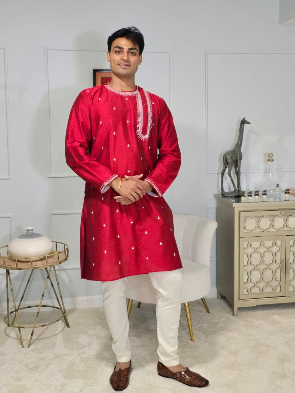 Men's red kurta with white thread embroidered around neck and cuffs, side pockets, full sleeves with side closure - traditional Indian wear for social occasions and festivals
