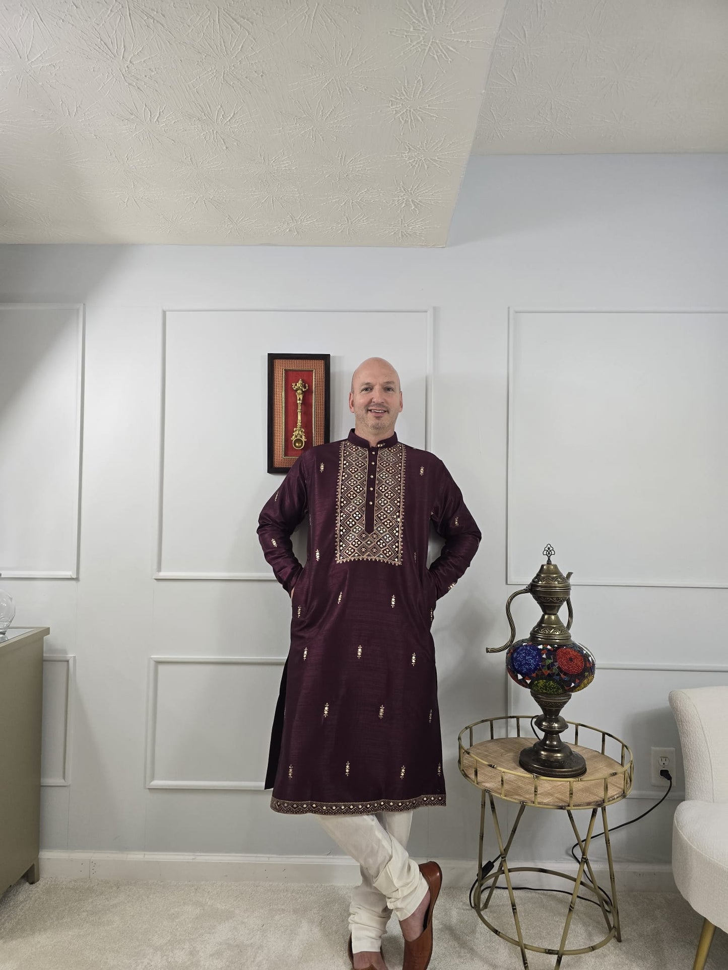 Men's maroon kurta with embroidered neckline paired with white churidar, mandarin collar, side pockets, full sleeves - premium Indian formal wear for weddings and special occasions