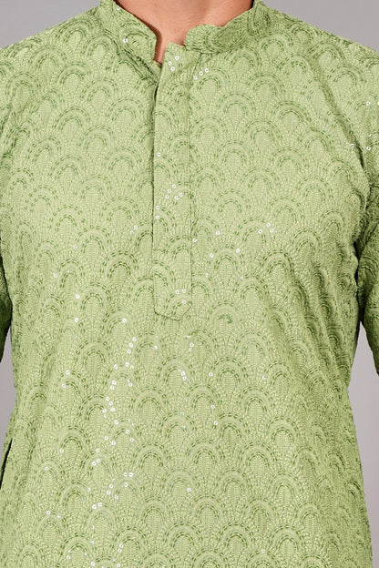 Men light green color Kurta with sequin, full length, button closure, one fourth placket, full sleeves, mandarin collar, side pockets, traditional ethnic wear for festivals, family occasions, wedding, house warming, casual wear