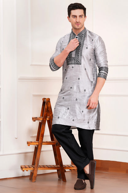 Men's gray silk kurta with black embroidered mandarin collar and cuffs, side pockets, full sleeves with black pants - traditional Indian formal wear for weddings and festivals