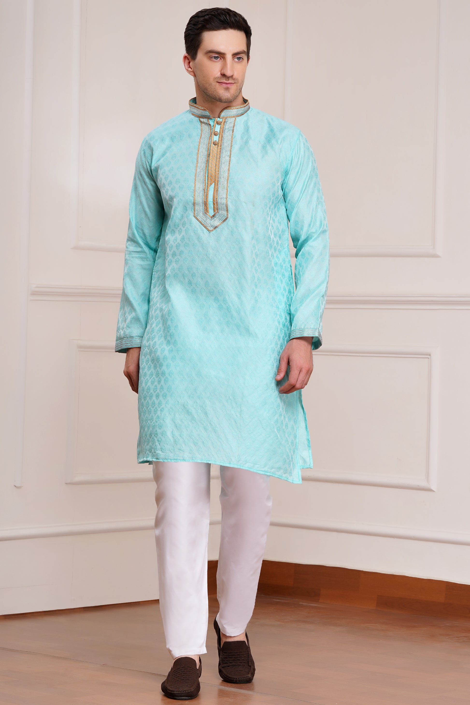 Men's light blue brocade kurta with gold embroidered neckline paired with white churidar, mandarin collar, side pockets, full sleeves - premium Indian formal wear for weddings and special occasions