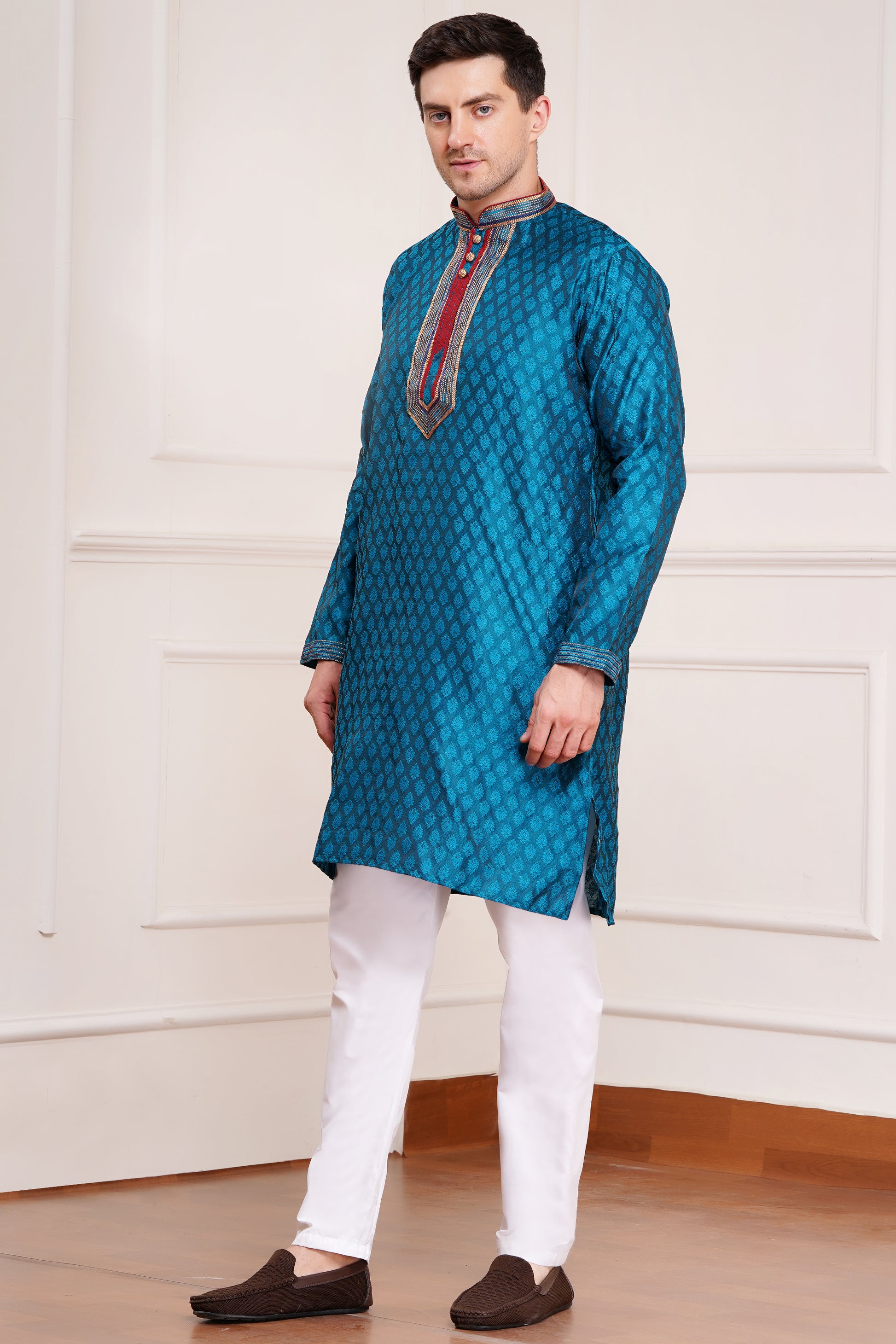 Men's teal blue brocade kurta with red and gold embroidered neckline paired with white churidar, mandarin collar, side pockets, full sleeves - premium Indian formal wear for weddings and special occasions