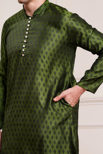 Men's bright green / henna silk kurta with gold brocade diamond pattern and white churidar pants, decorative buttons with loop closure, mandarin collar, full sleeves, side pockets - traditional Indian festive wear