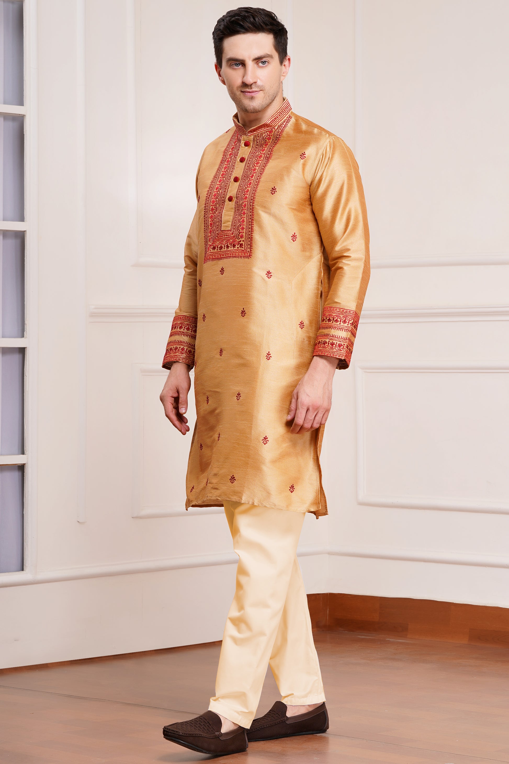 Men's beige silk kurta with maroon embroidered mandarin collar and cuffs, side pockets, full sleeves with off-white or cream pants - traditional Indian formal wear for weddings and festivals