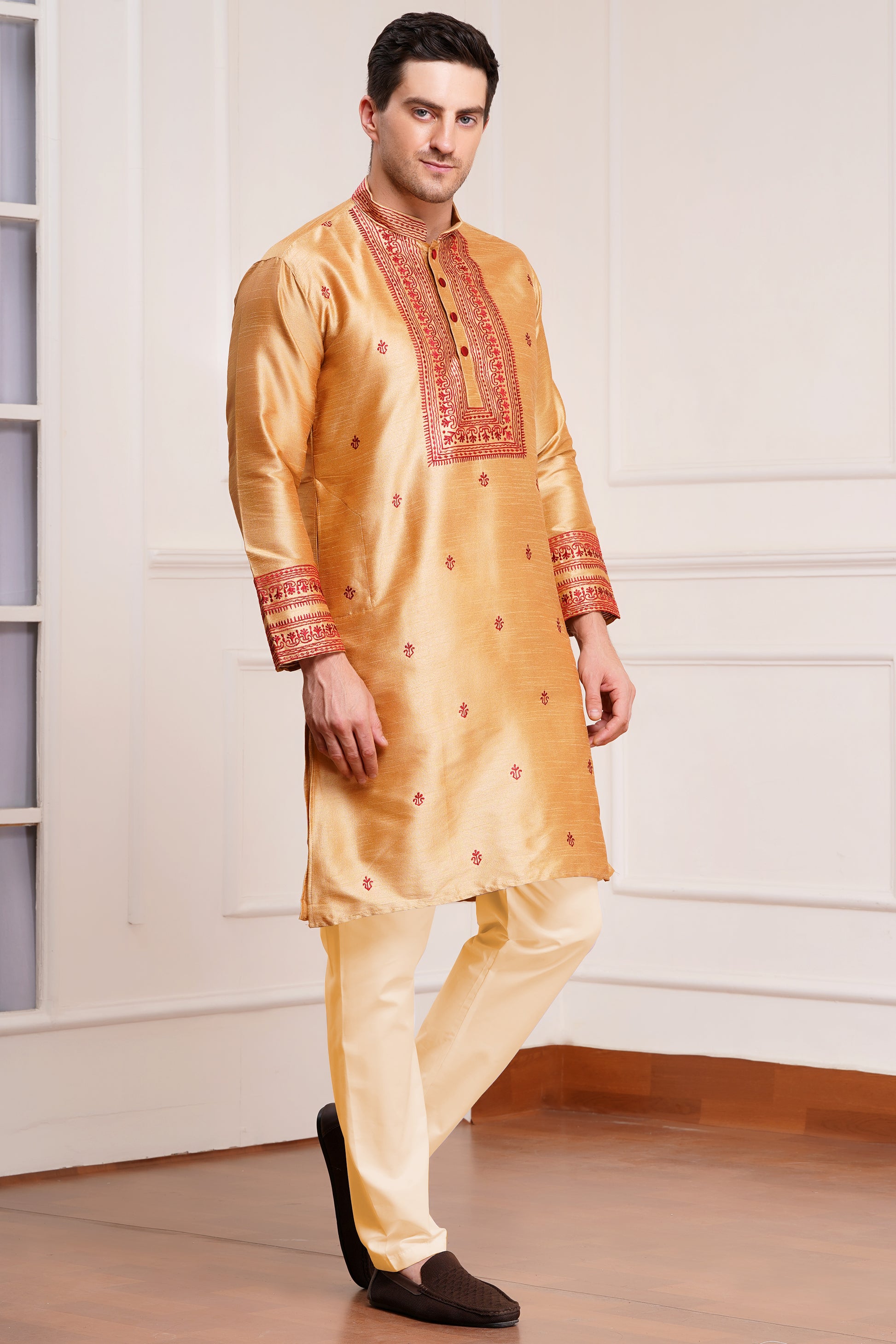 Men's beige silk kurta with maroon embroidered mandarin collar and cuffs, side pockets, full sleeves with off-white or cream pants - traditional Indian formal wear for weddings and festivals