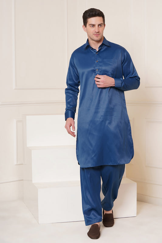 Men blue Pathani suit set with knee-length kurta and matching trousers, shirt collar, button closure, front and side pockets, full sleeves with cuff button closure - traditional casual and festive ethnic wear