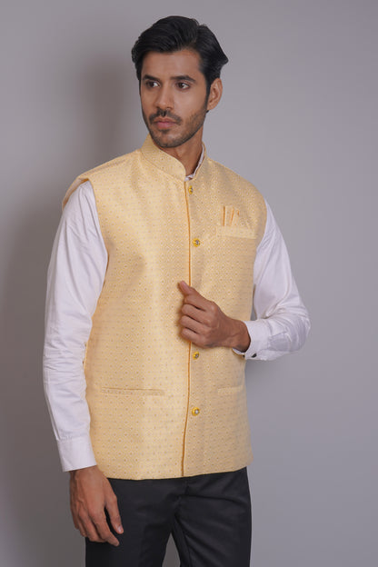Men's light yellow cotton Nehru jacket with subtle self-print pattern, gold buttons, and mandarin collar - perfect for casual and festive occasions