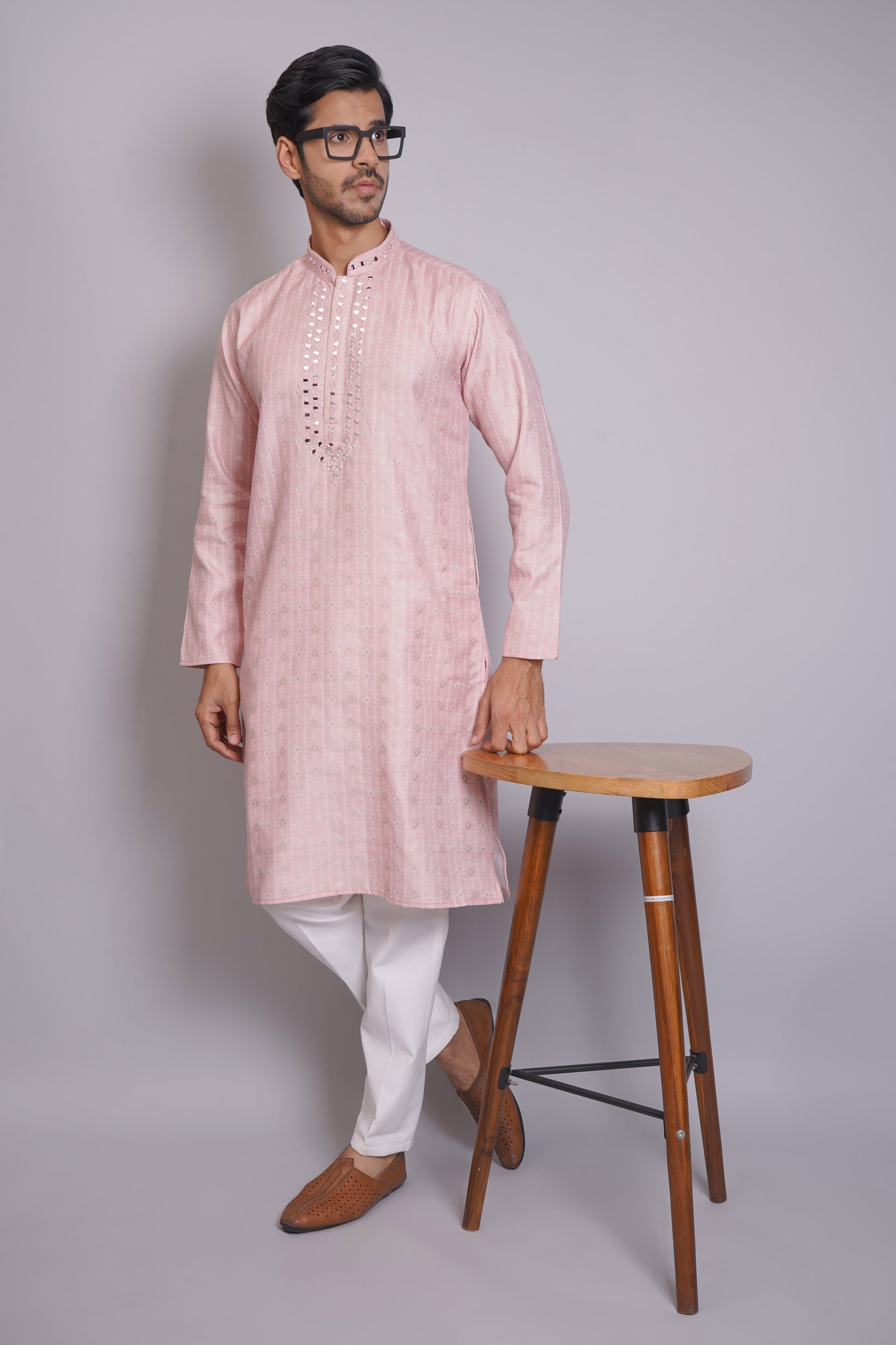 Men's pink kurta with mirror embroidered neckline paired with white churidar, mandarin collar, side pockets, full sleeves - premium Indian formal wear for weddings and special occasions