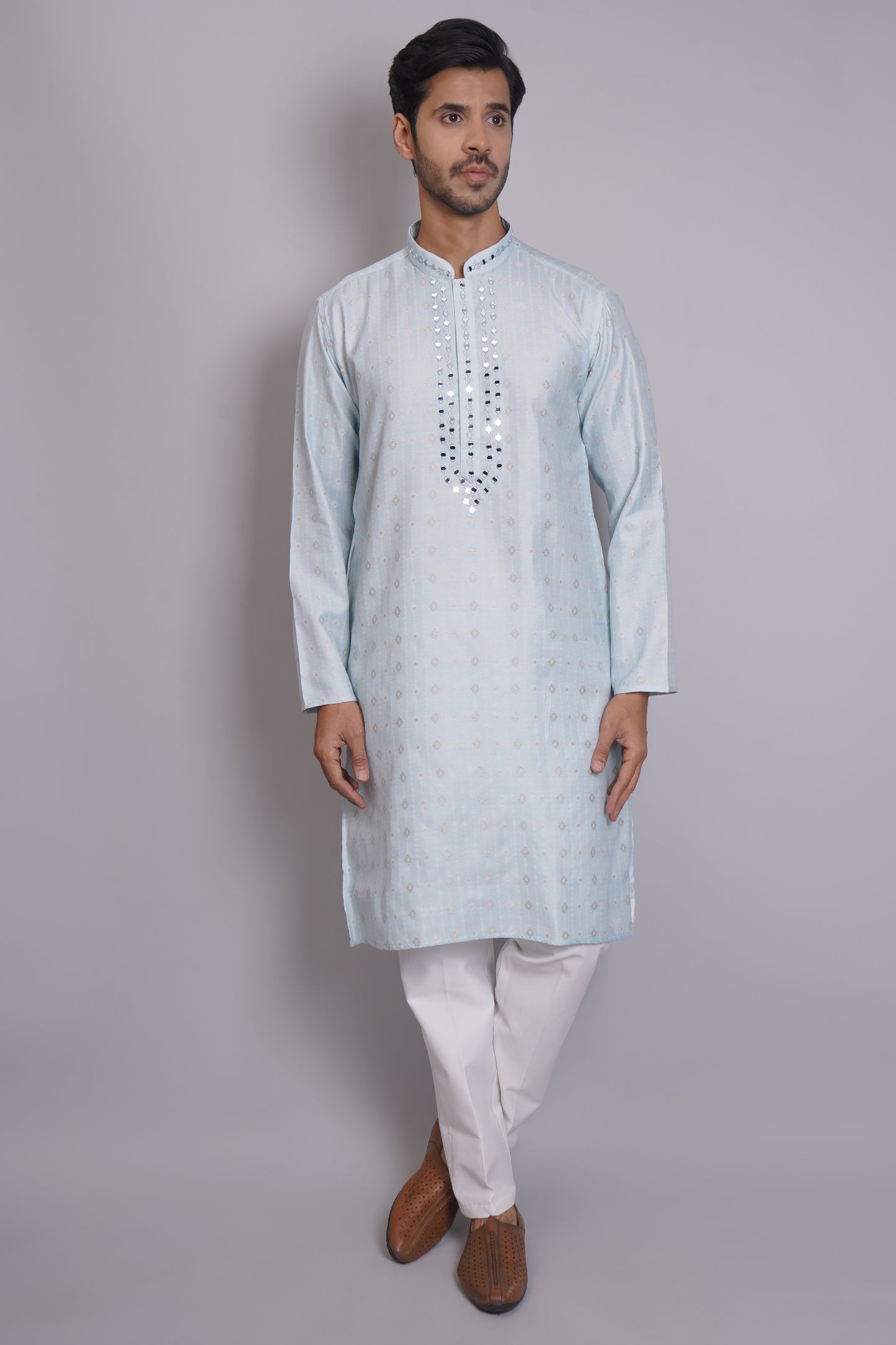 Men's light blue kurta with mirror embroidered neckline paired with white churidar, mandarin collar, side pockets, full sleeves - premium Indian formal wear for weddings and special occasions
