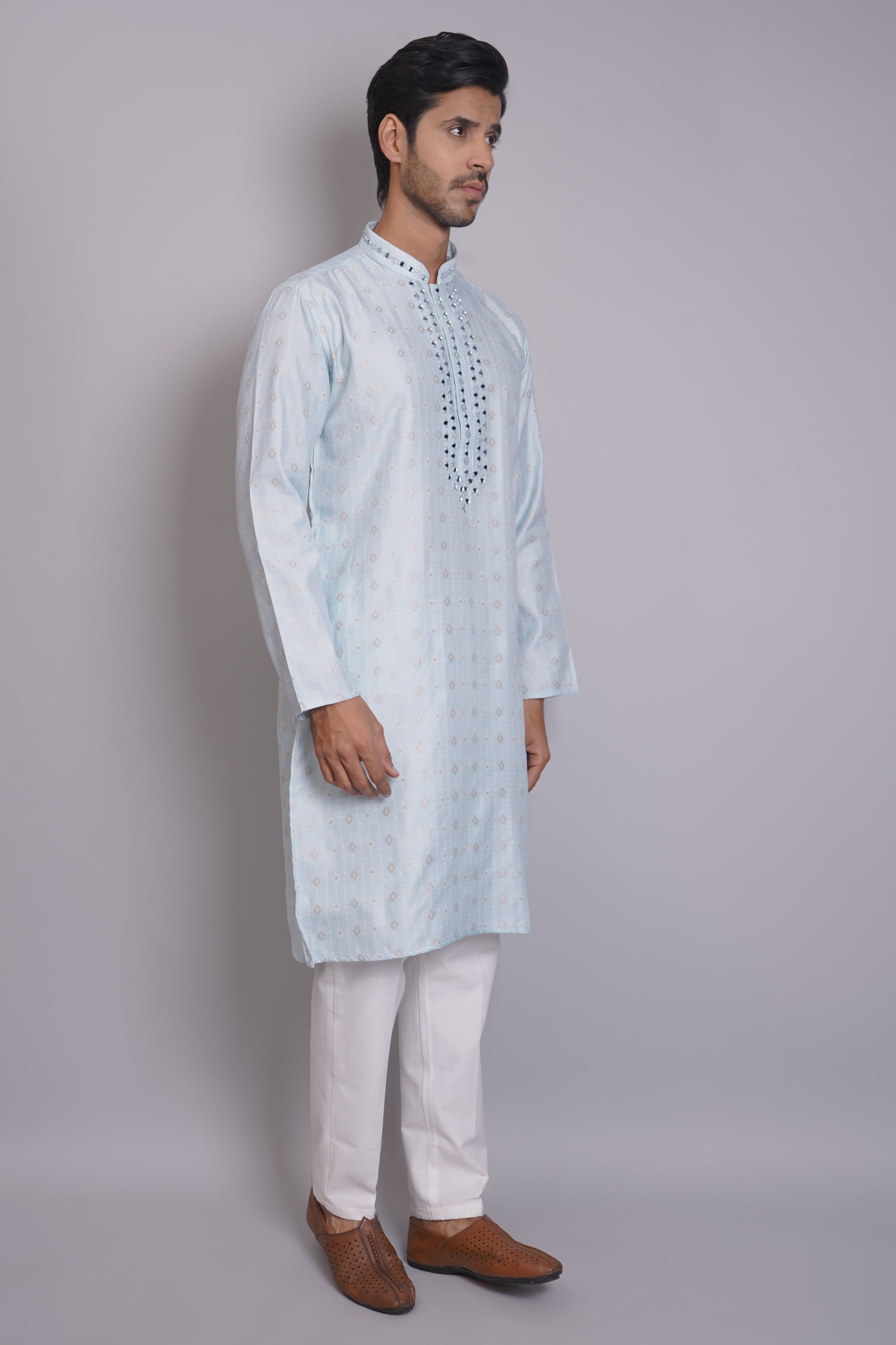 Men's light blue kurta with mirror embroidered neckline paired with white churidar, mandarin collar, side pockets, full sleeves - premium Indian formal wear for weddings and special occasions