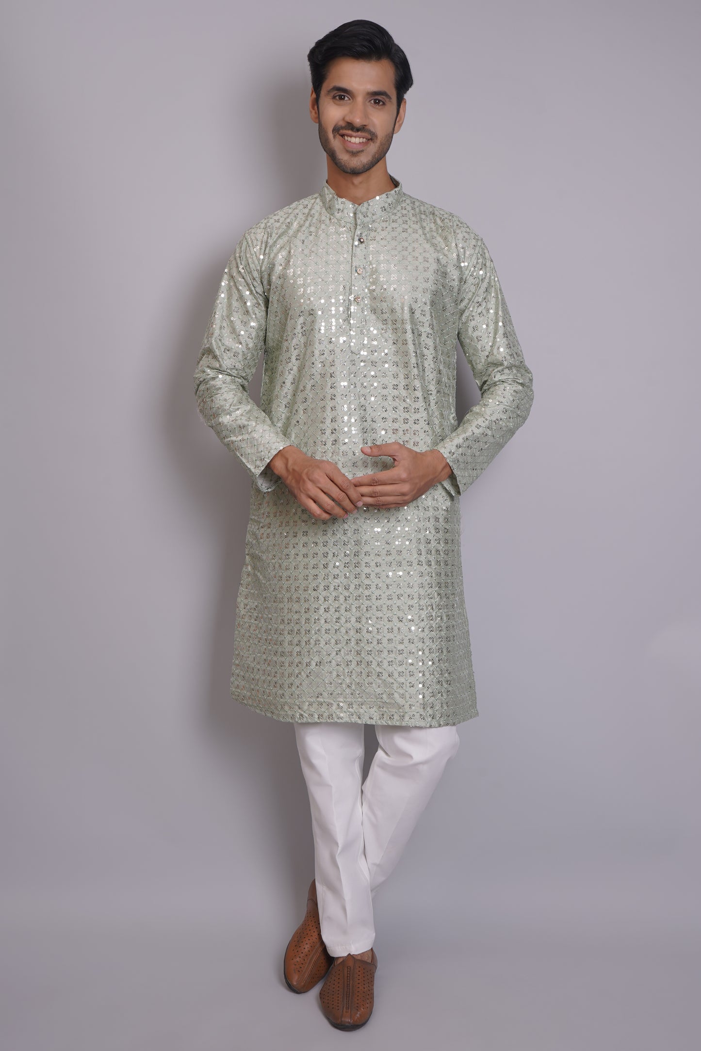 Men's soft green sequin kurta with mandarin collar and white pajama, featuring all-over sequin embellishment for Indian ethnic wear and festive occasions