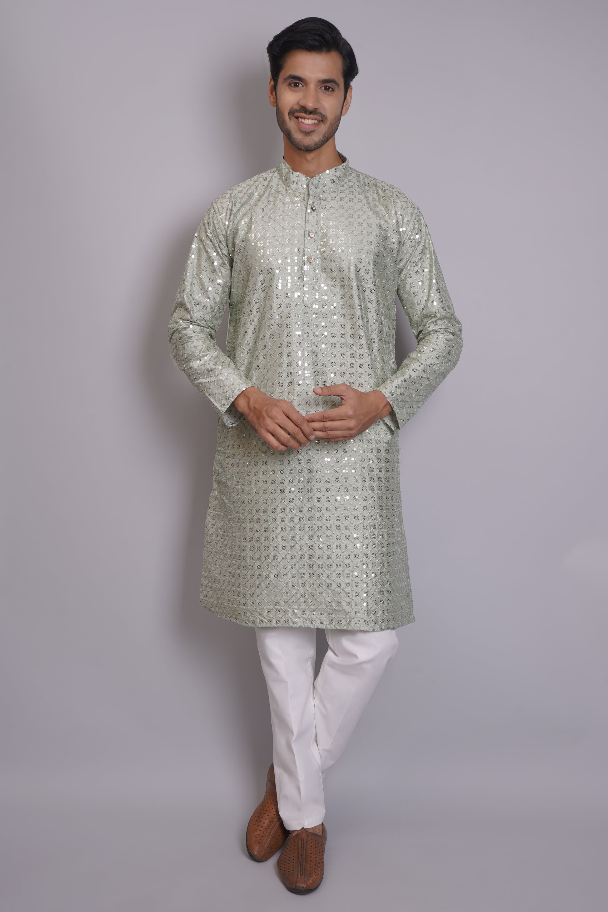 Men's soft green sequin kurta with mandarin collar and white pajama, featuring all-over sequin embellishment for Indian ethnic wear and festive occasions