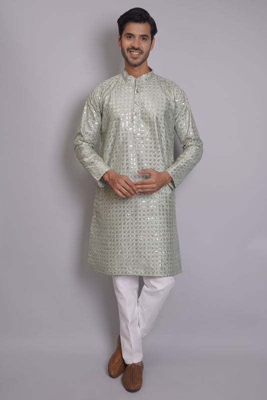 Men's soft green sequin kurta with mandarin collar and white pajama, featuring all-over sequin embellishment for Indian ethnic wear and festive occasions