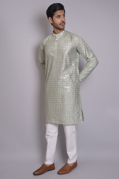 Men's soft green sequin kurta with mandarin collar and white pajama, featuring all-over sequin embellishment for Indian ethnic wear and festive occasions