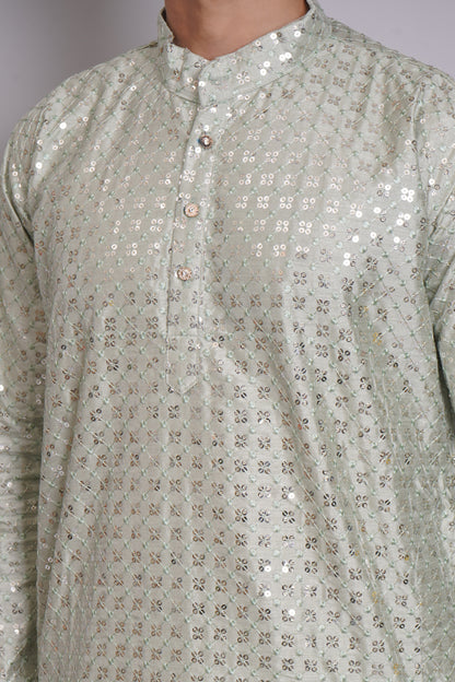 Men's soft green sequin kurta with mandarin collar and white pajama, featuring all-over sequin embellishment for Indian ethnic wear and festive occasions