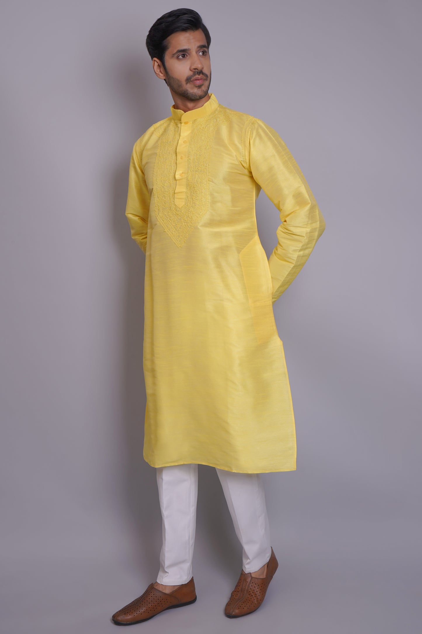 Men's yellow chikankari kurta with embroidered chest panel, band collar, long sleeves, perfect for festive and special occasions - Indian ethnic wear