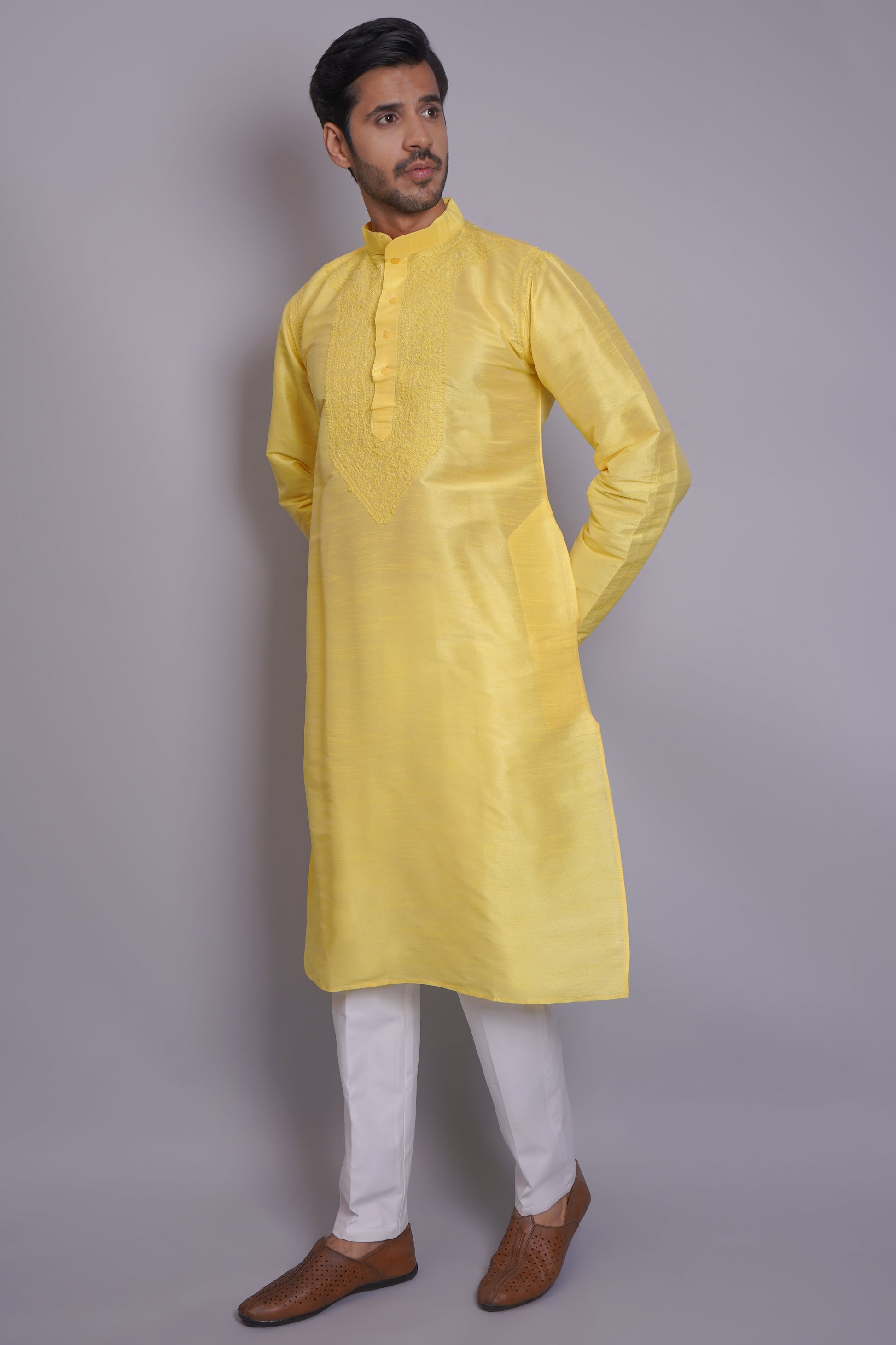 Men's yellow chikankari kurta with embroidered chest panel, band collar, long sleeves, perfect for festive and special occasions - Indian ethnic wear