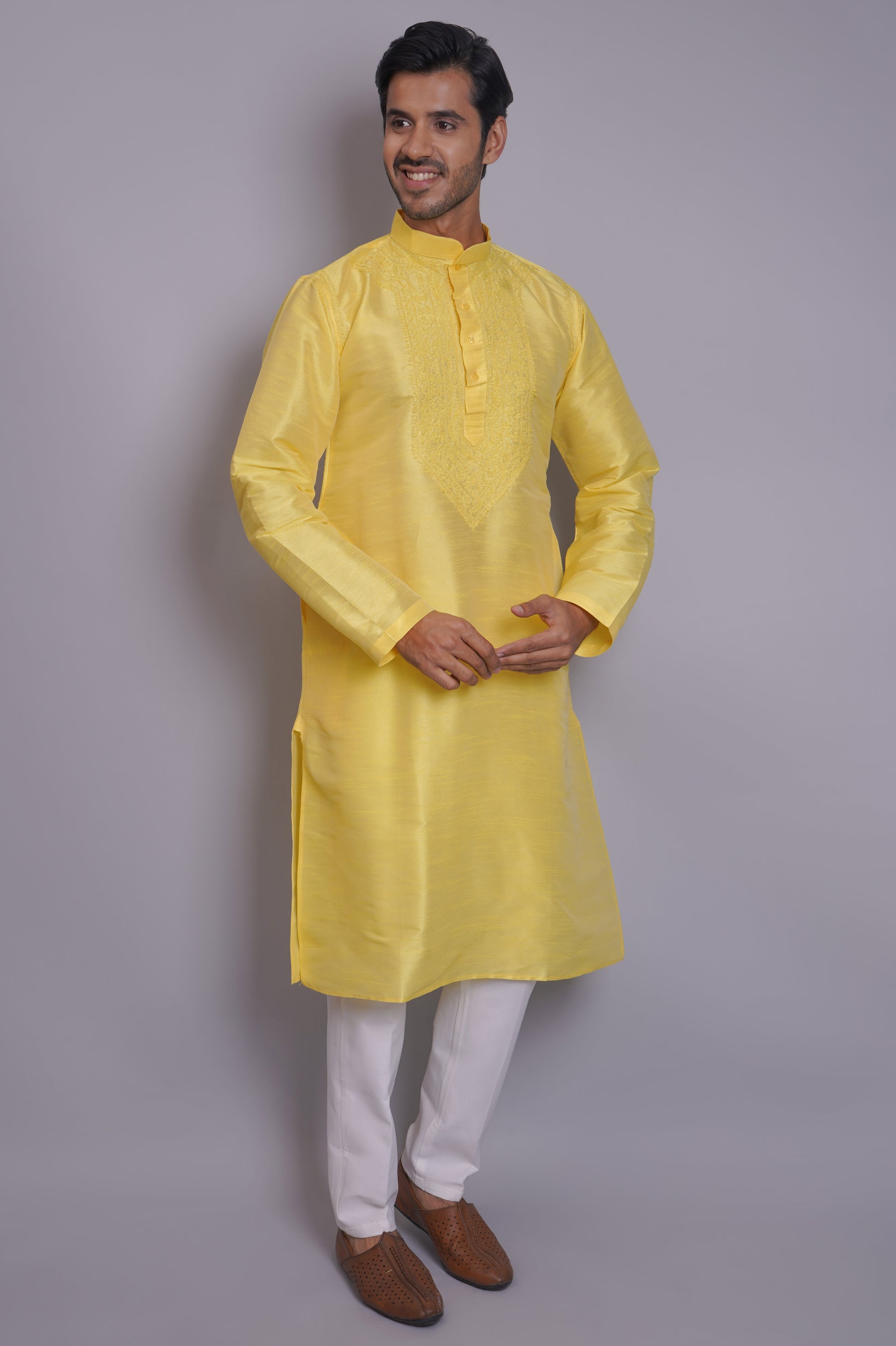 Men's yellow chikankari kurta with embroidered chest panel, band collar, long sleeves, perfect for festive and special occasions - Indian ethnic wear