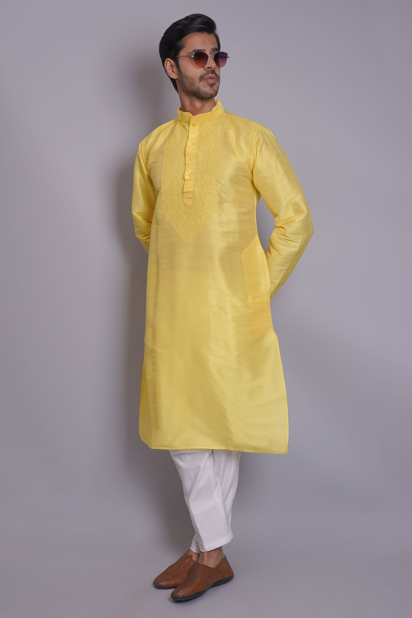 Men's yellow chikankari kurta with embroidered chest panel, band collar, long sleeves, perfect for festive and special occasions - Indian ethnic wear