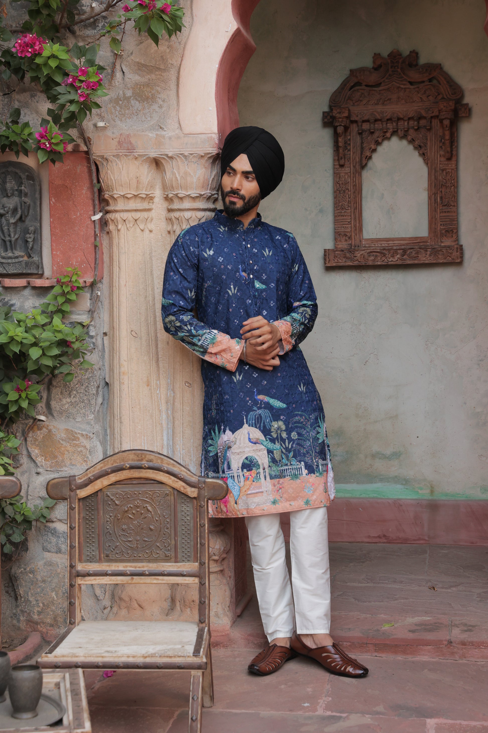 Men's blue kurta with Pichkari floral print and colorful traditional border design, mandarin collar, button closure, full length, side pockets - casual and social occasions Indian wear