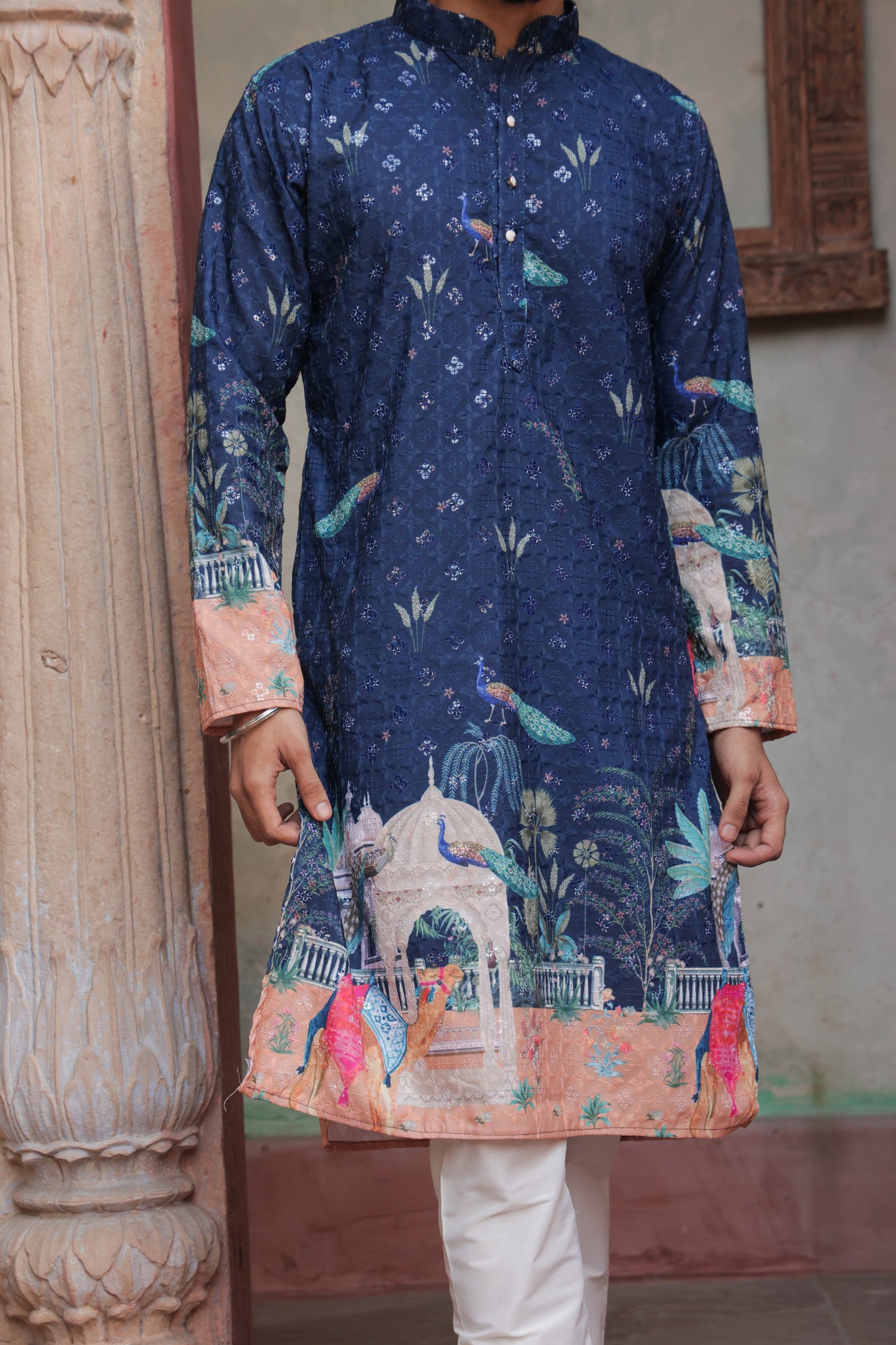 Men's blue kurta with Pichkari floral print and colorful traditional border design, mandarin collar, button closure, full length, side pockets - casual and social occasions Indian wear