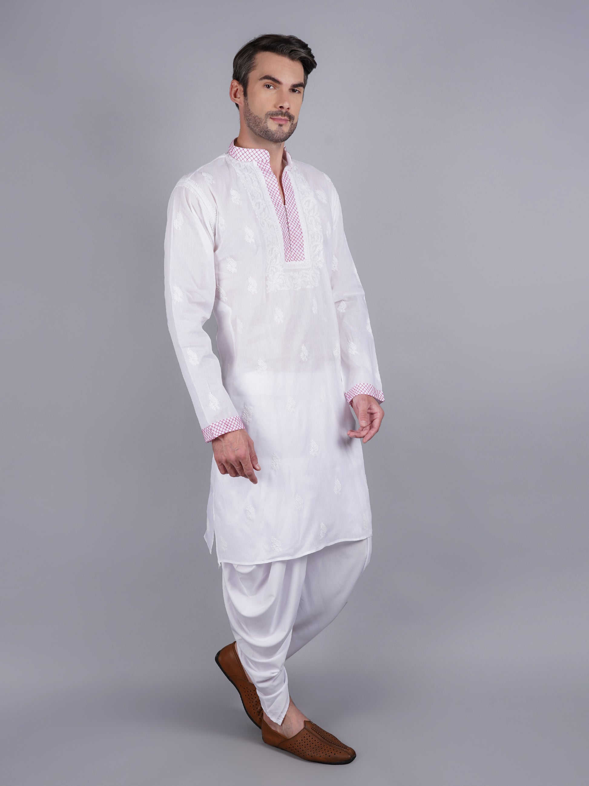 Men White chikankari Kurta  made of pure white Linen, full length, button closure, pink thread work on placket, full sleeves, mandarin collar, side pockets, traditional wear for family occasions, casual wear