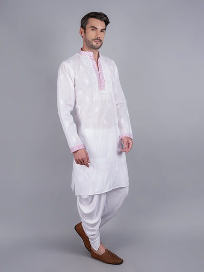 Men White chikankari Kurta  made of pure white Linen, full length, button closure, pink thread work on placket, full sleeves, mandarin collar, side pockets, traditional wear for family occasions, casual wear